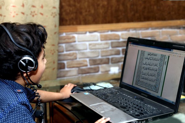 Teacher with a turban teaching online